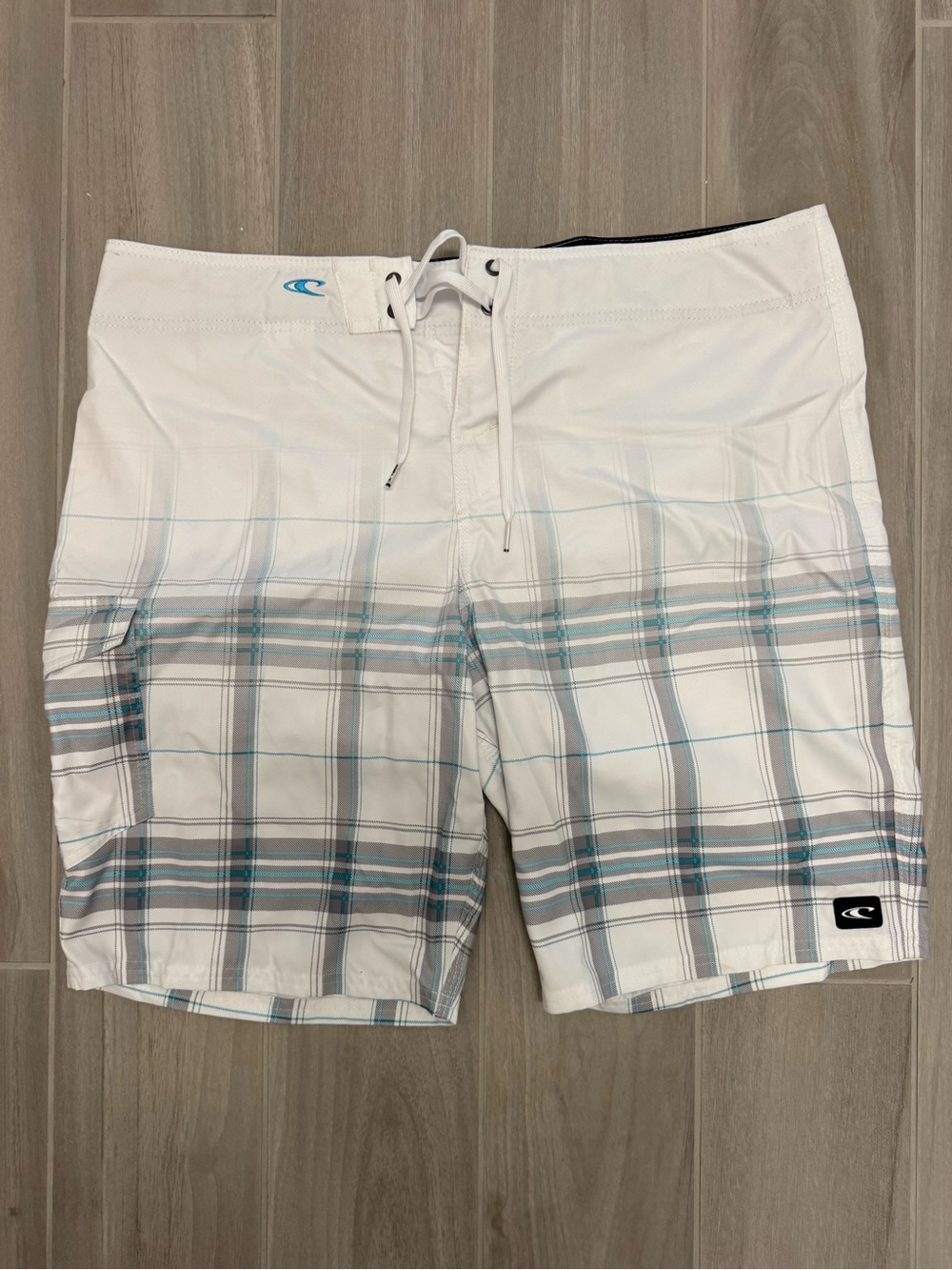 Men's O’Neill White Plaid Swim Trunks with Teal Accent